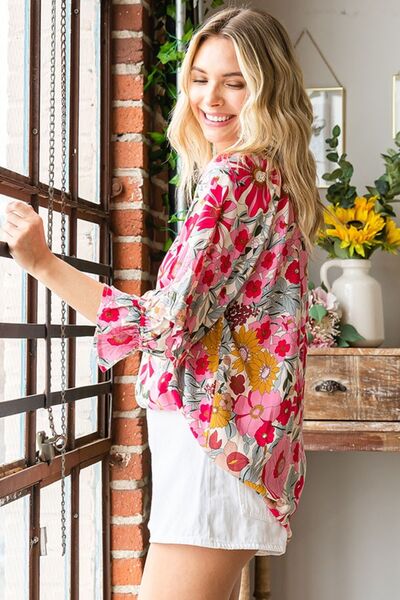 Introducing the Printed Tie Neck Flounce Sleeve Blouse: a chic and feminine addition to your wardrobe, perfect for infusing elegance into any ensemble. Its sophisticated tie neck detail exudes charm, while the playful flounce sleeves add a touch of romance. Crafted from premium materials, this blouse guarantees both comfort and durability