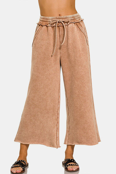Acid Wash Fleece Wide Leg Pants, a new take on the timeless. Their acid wash finish brings vintage charm and edgy appeal to any outfit. Made from a premium leather fabric, these pants offer comfort and warmth, perfect for colder days