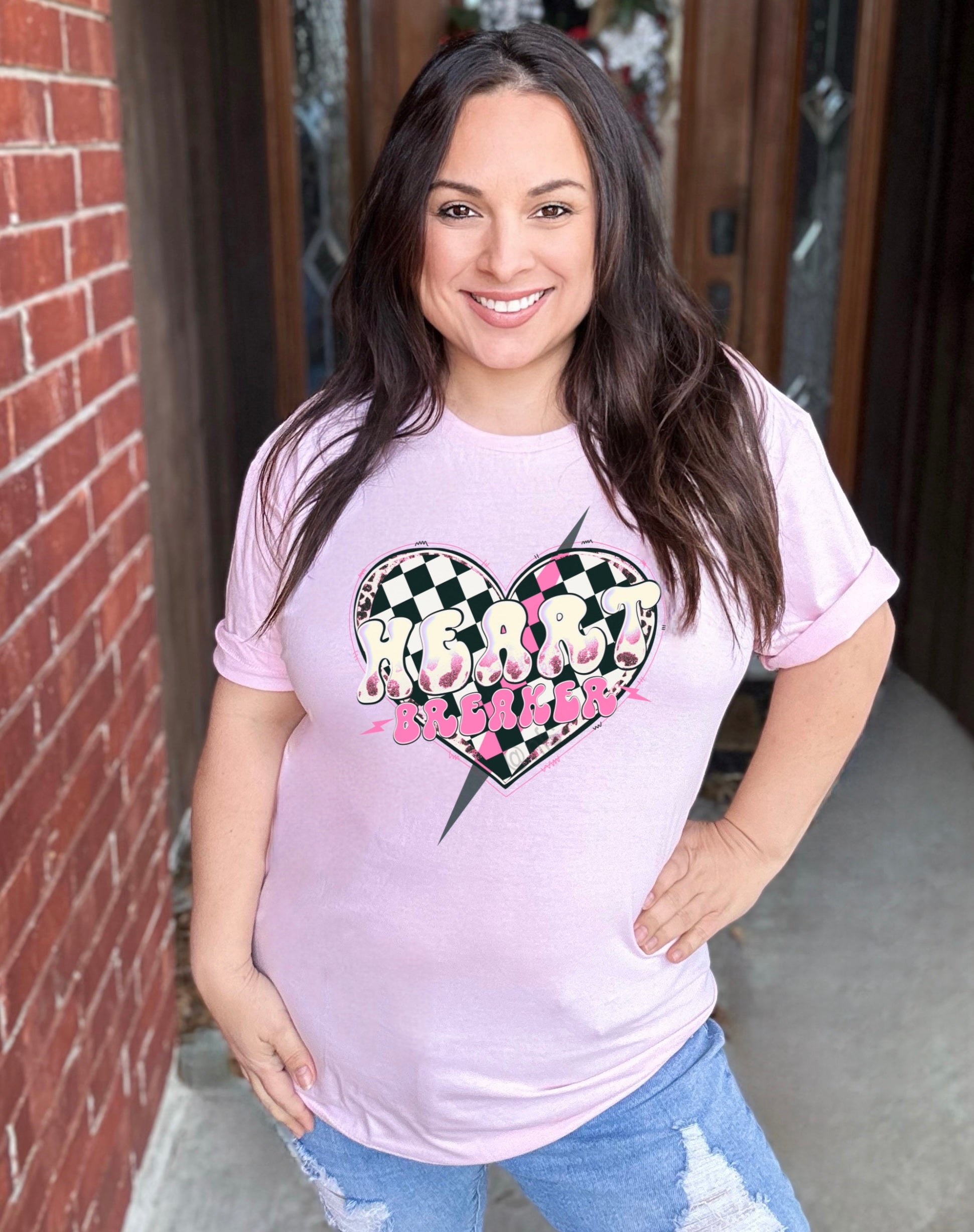 Get ready to break some hearts with our Heartbreaker Pink Graphic Tee! This stylish tee is sure to turn heads with its unique design and playful attitude. Made from high-quality materials, it's both comfortable and stylish. Don't be afraid to show off your playful and quirky side with this fun and flirty tee.

Unisex Fit , Available in Small to 4X
