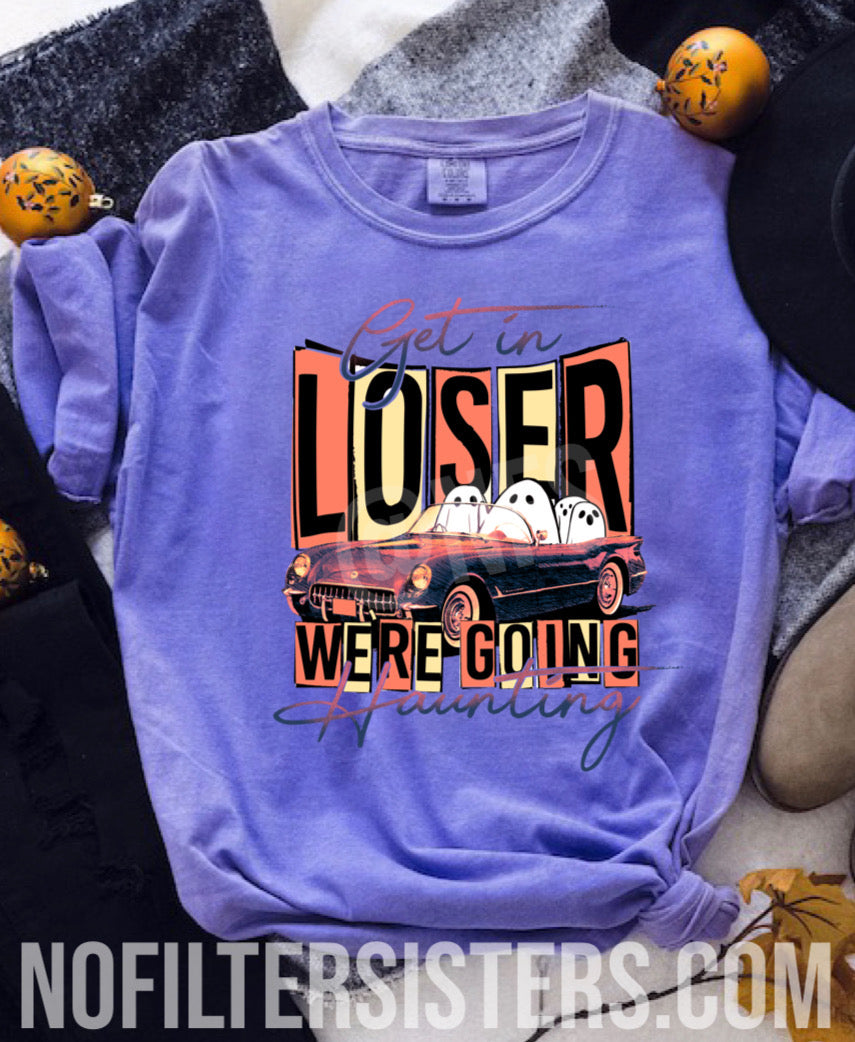 Show off your spooky style with this “Get In Loser, We’re Going Haunting” Graphic Tee. Perfect for horror movie fans, this lightweight and comfortable tee offers a stylish way to show your love for all things mysterious.