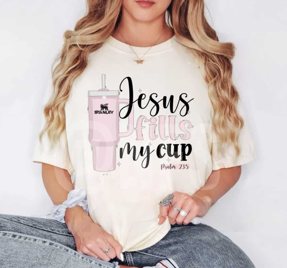 Jesus Fills My Cup' Unisex Women's  T shirt, designed to offer both comfort and a true-to-size fit. Wear your faith with pride in this stylish tee, which combines a meaningful message with a comfortable fit