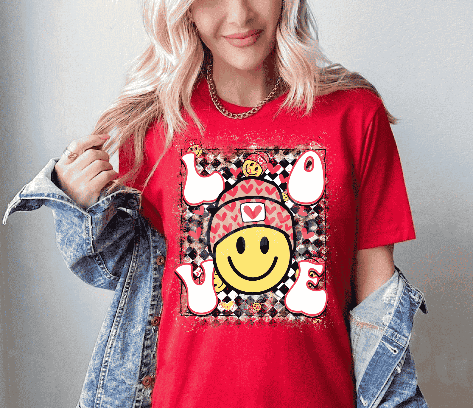 The Smiley Love Red - Valentine Graphic Women's Tee Shirt is an adorable and comfortable addition to your wardrobe. Made with soft cotton and featuring a bright smiley face design, this tee is sure to spread joy wherever you go. 