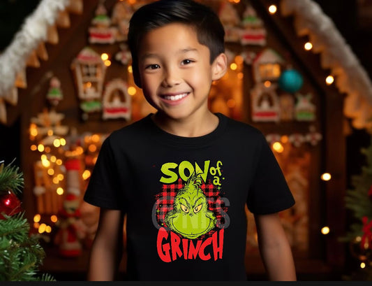 holiday cheer with this perfect Kids Grinch Shirt for winter! Introducing our 'Son of a Grinch Tee' – the perfect way to flaunt your festive spirit this holiday season